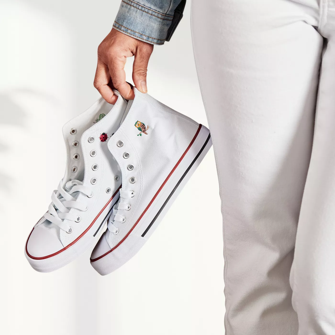 Image of a pair of shoes with embroidery completed on a Brother Entrepreneur One PR1x embroidery machine